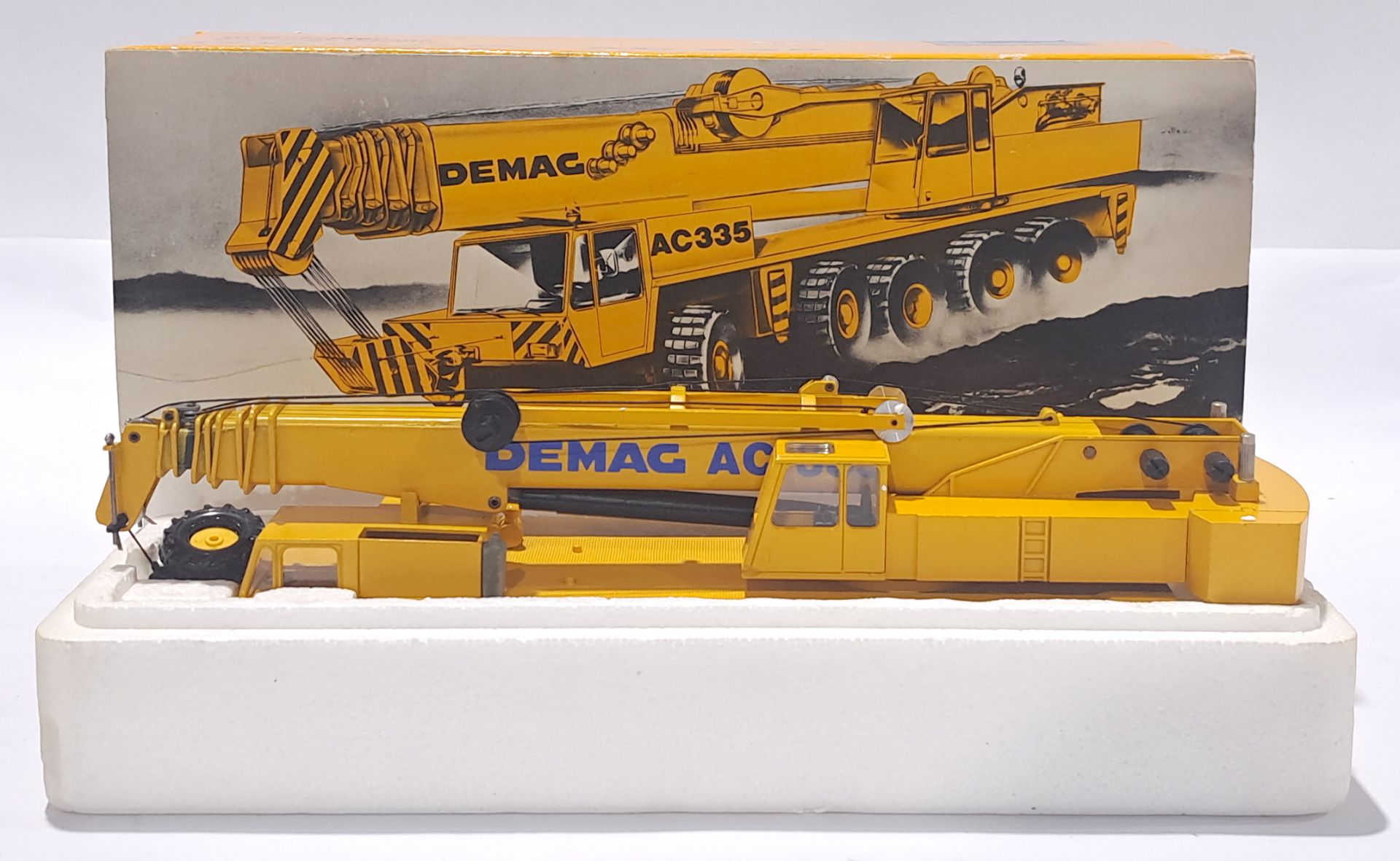 Conrad a boxed 1:50 Scale No.2081 Demag AC335 All-Terrain Crane. Condition is Excellent (unchecke...