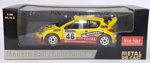 Sun Star a boxed #3858 Peugeot 206 WRC, V.Rossi/C. Cassina Rally GB 2002. Conditions generally ap...