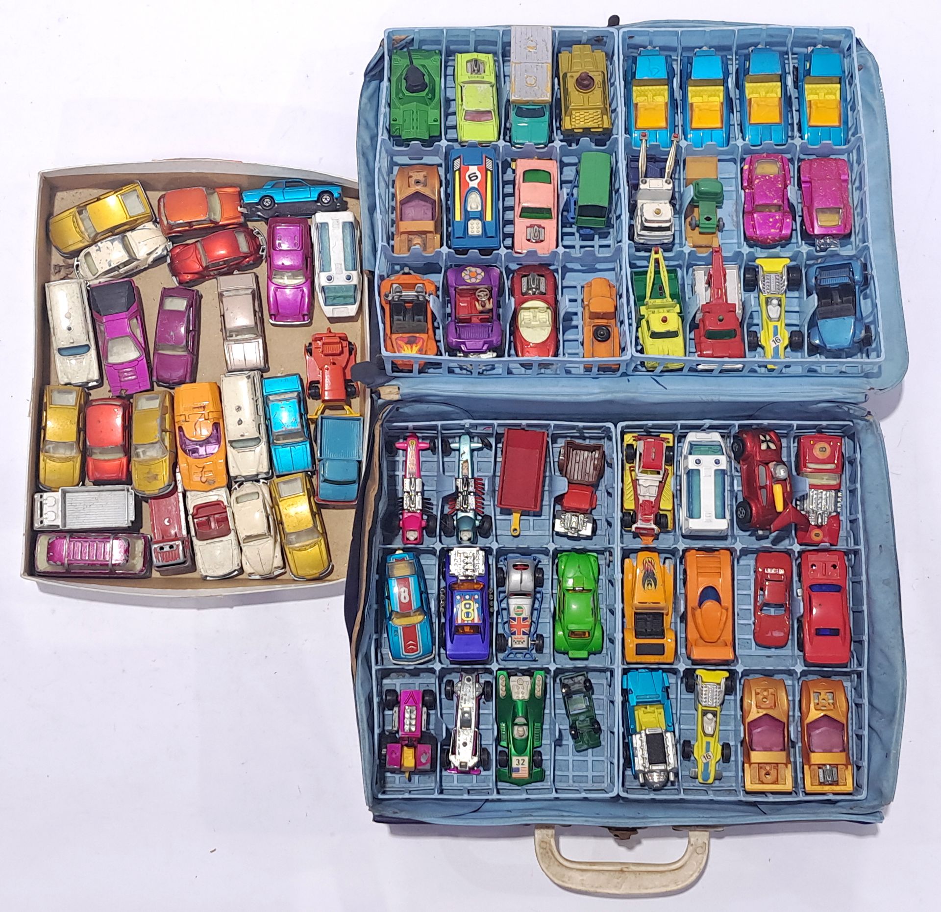 Matchbox a Carry case full with Matchbox Cars and similar with extra Matchbox cars in separate bo...