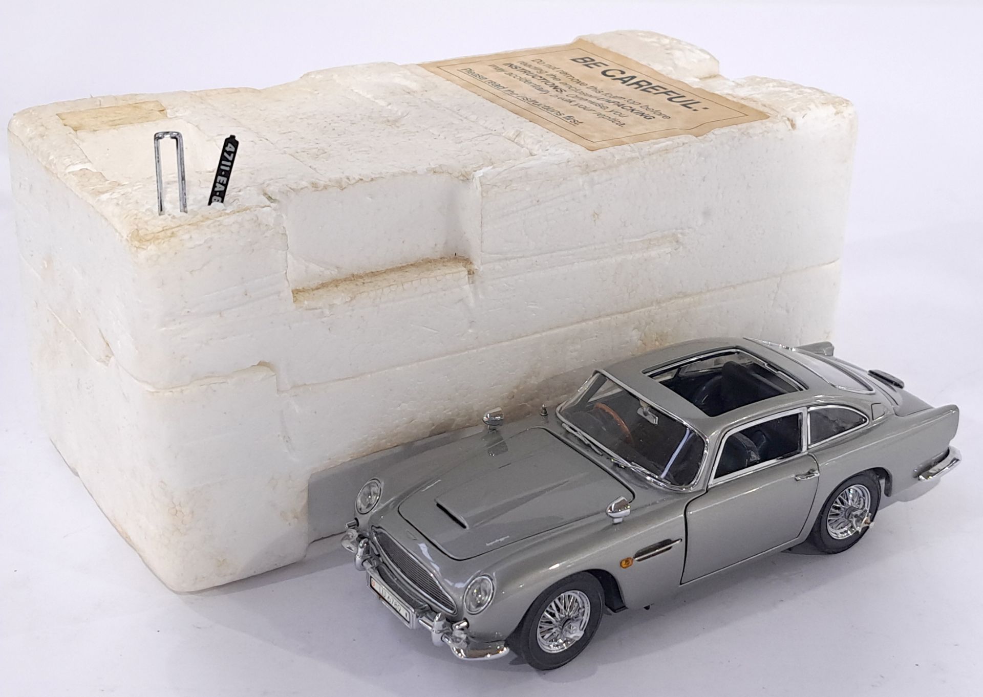 Danbury Mint a part boxed 1/24 scale James Bond 007 Aston Martin DB5 (Chrome). Conditions general...