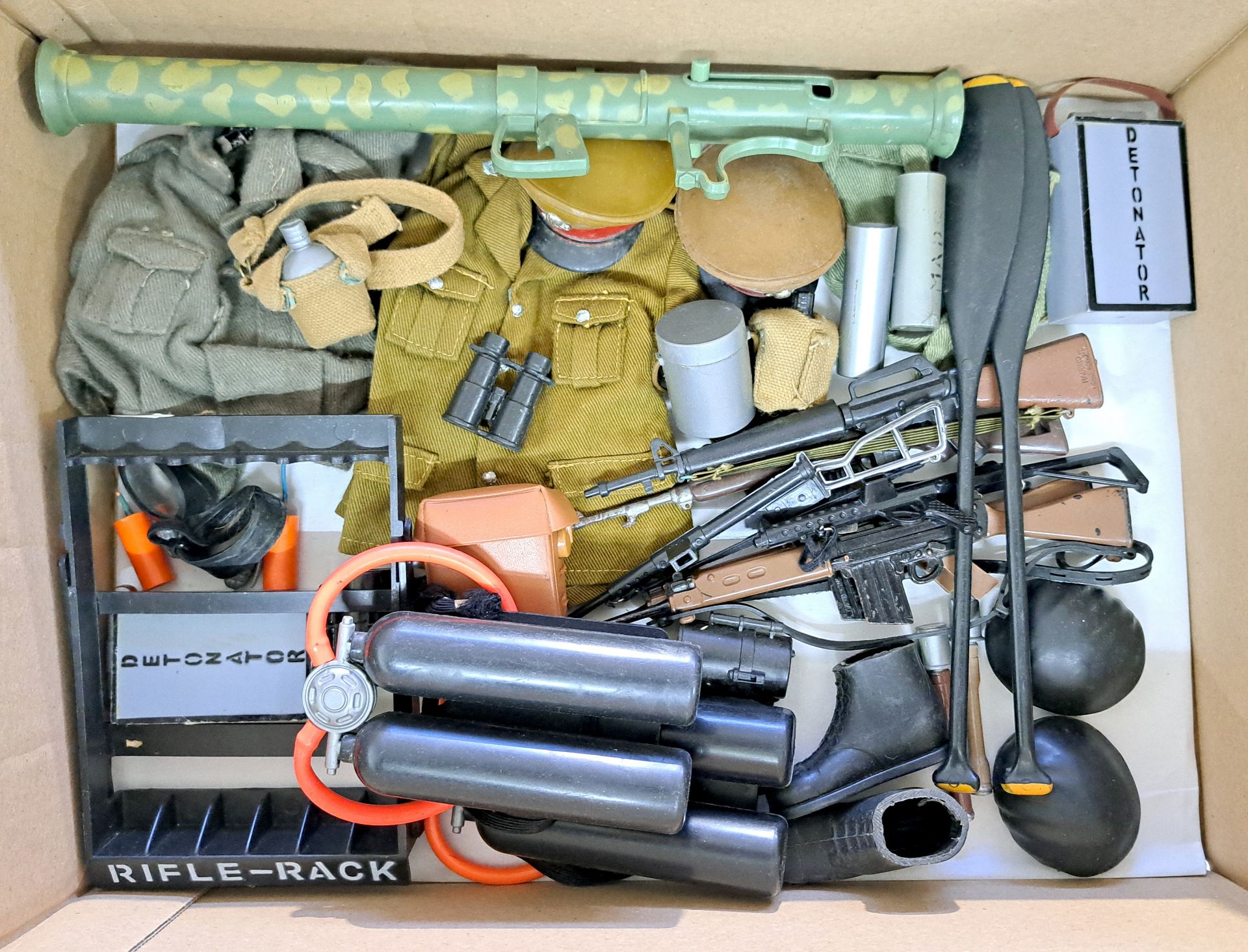 Palitoy Action Man vintage, a group of loose guns/weapons to include Bazooka, Machine guns, Rifle...
