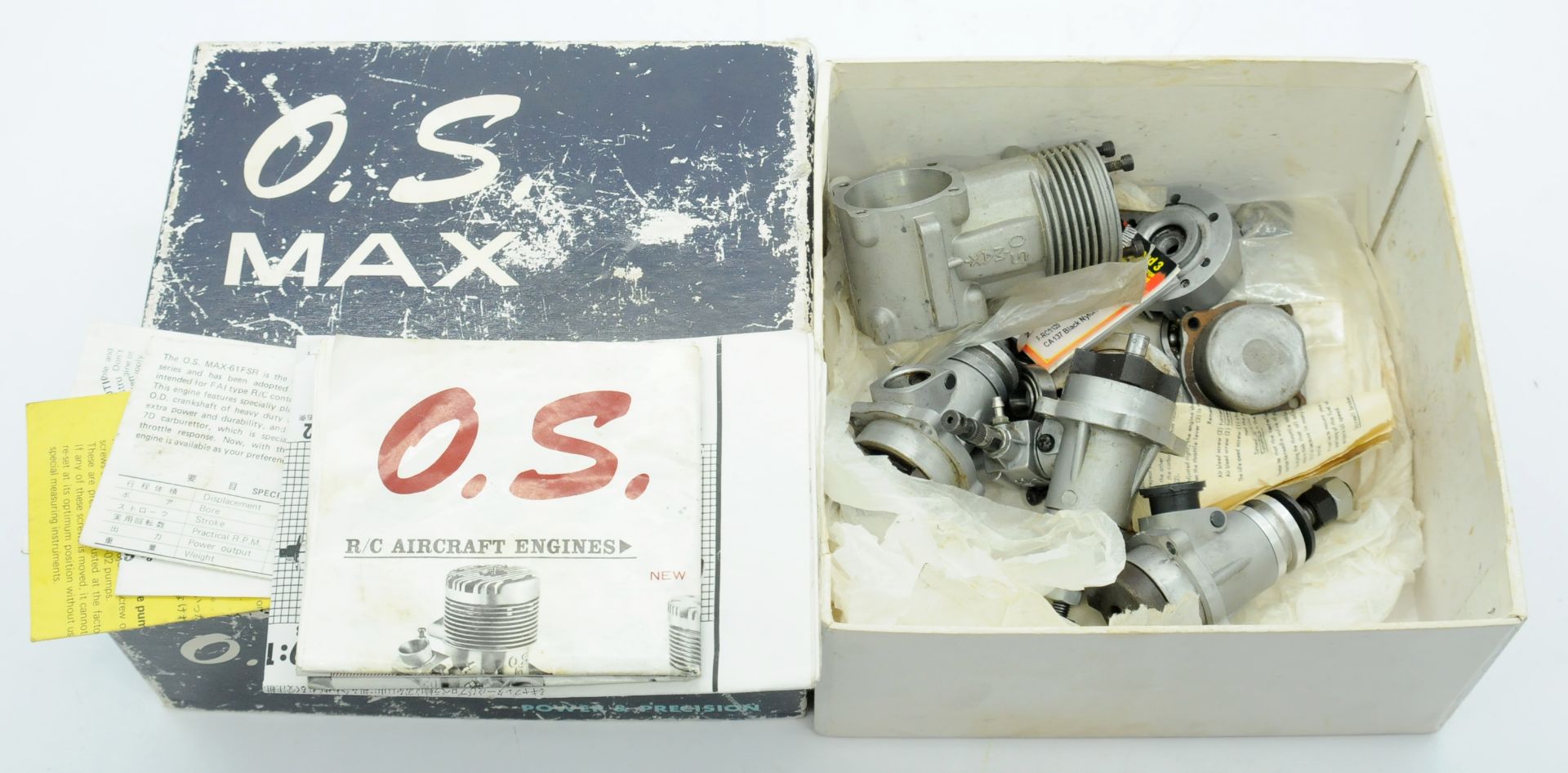 OS Max a boxed 61F SR (GS A-2)Propeller Reduction Gear Engine which is incomplete along with spar...