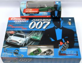Carrera 60007 "James Bond" Slot Car Set - containing Aston Martin Vanquish and Jaguar XKR - condi...