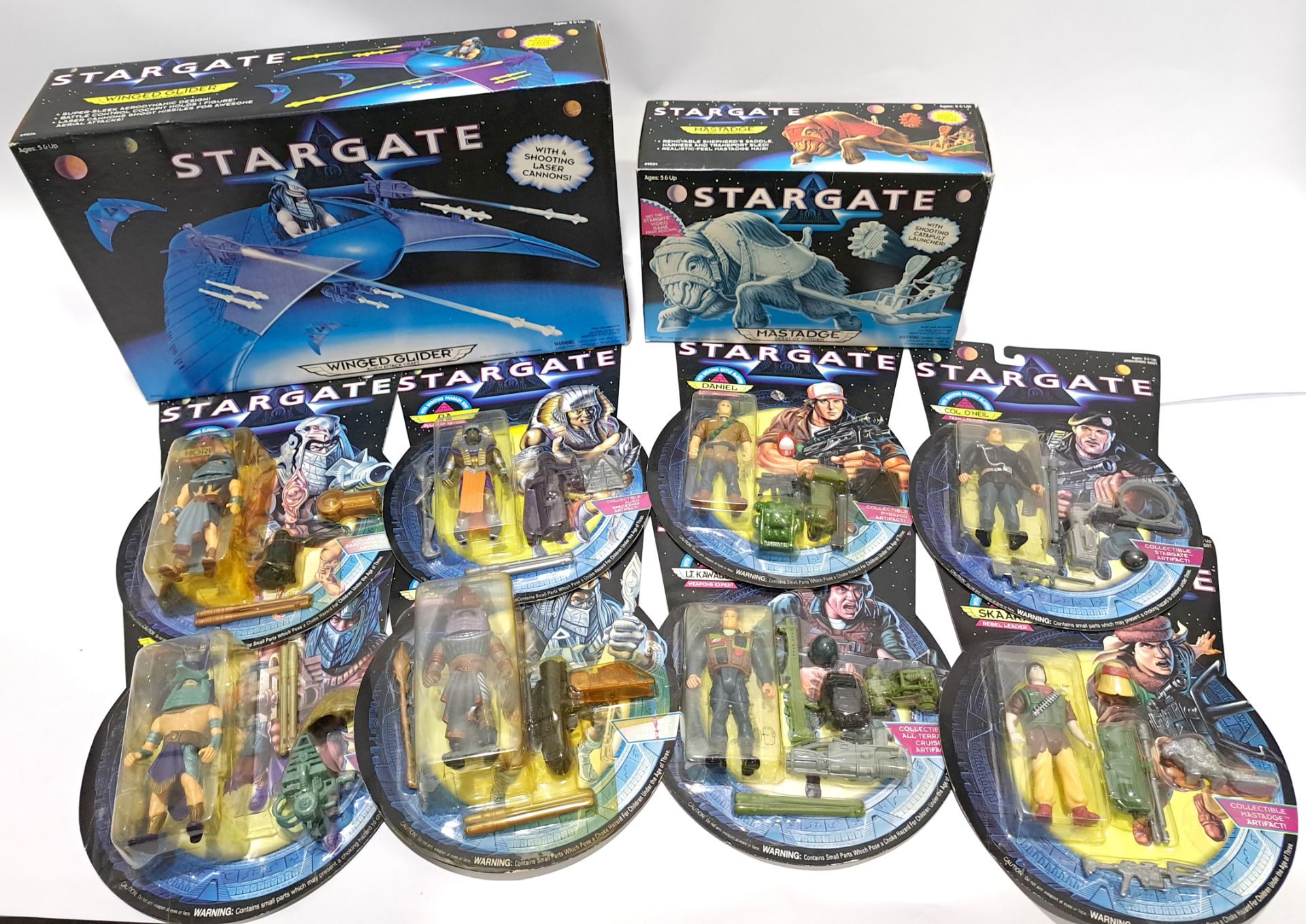 Quantity of Stargate Carded Figures and Vehicle Playsets