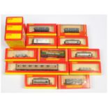 Hornby OO gauge a boxed group of single and triple pack rolling stock to include