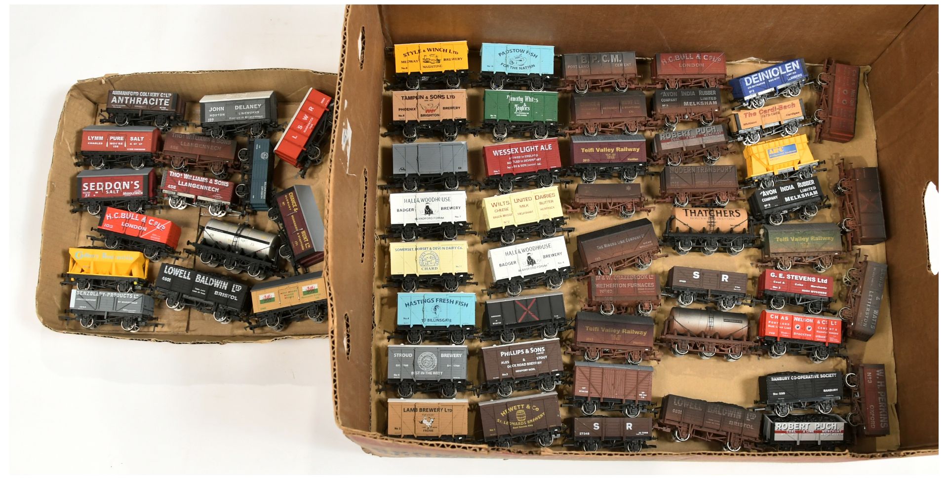 Dapol large group of unboxed wagons.