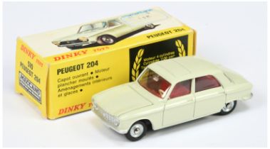 Spanish Dinky Toys 510 Peugeot 204 Saloon - Cream body, red interior, silver trim and concave hubs