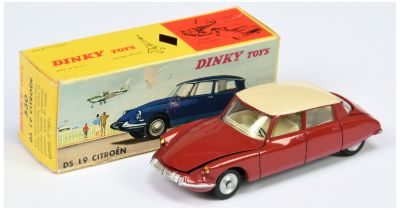 French Dinky Toys 534 Citroen DS19 Dark red body, cream roof, ivory interior, silver trim and con...
