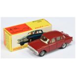 French Dinky Toys 1410 Moskvitch Saloon - Dark red body, ivory interior, chrome trim and concave hub