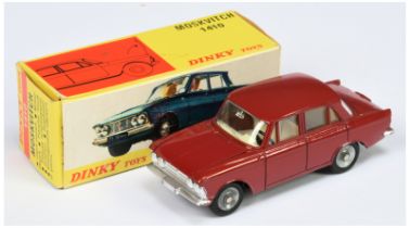 French Dinky Toys 1410 Moskvitch Saloon - Dark red body, ivory interior, chrome trim and concave hub