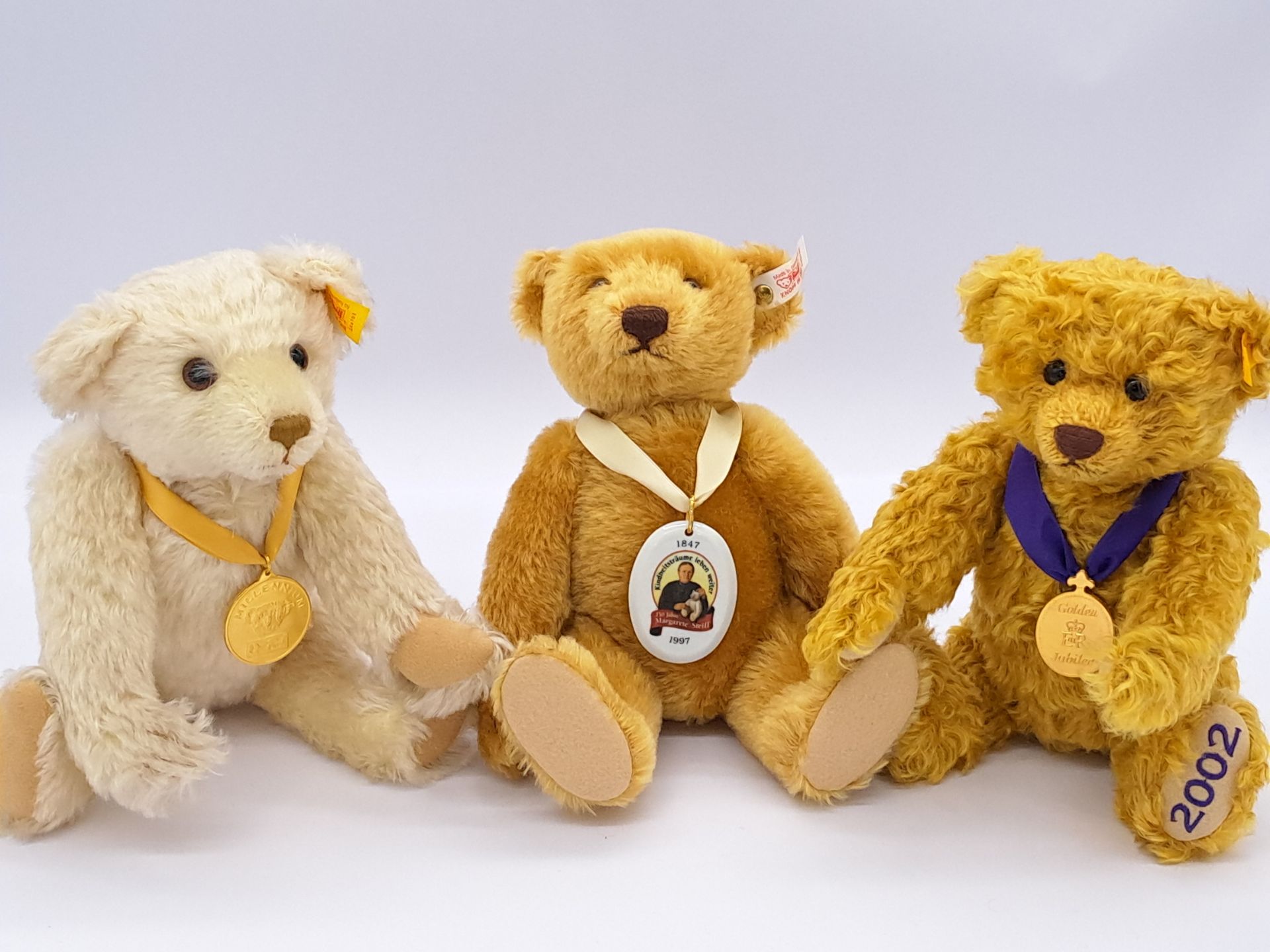 Steiff trio of bears: (1) The Millennium Bear, (2) The Golden Jubilee Bear, (3) 150 Anniversary Bear