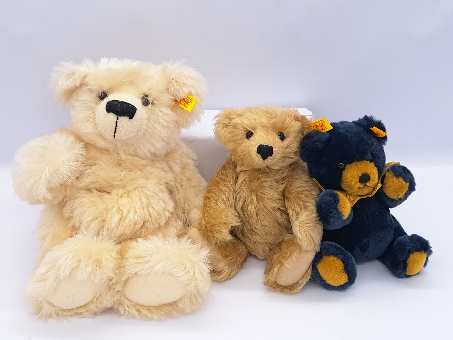 Steiff trio of teddy bears: (1) Mr. Cinnamon; (2) Classic 2001 bear; (3) Little Evening Star