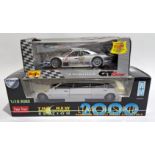 A boxed pair of 1:18 scale diecast models