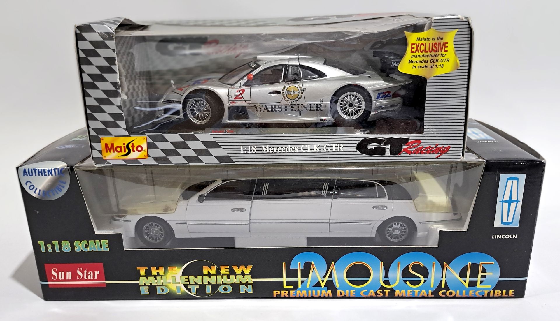 A boxed pair of 1:18 scale diecast models