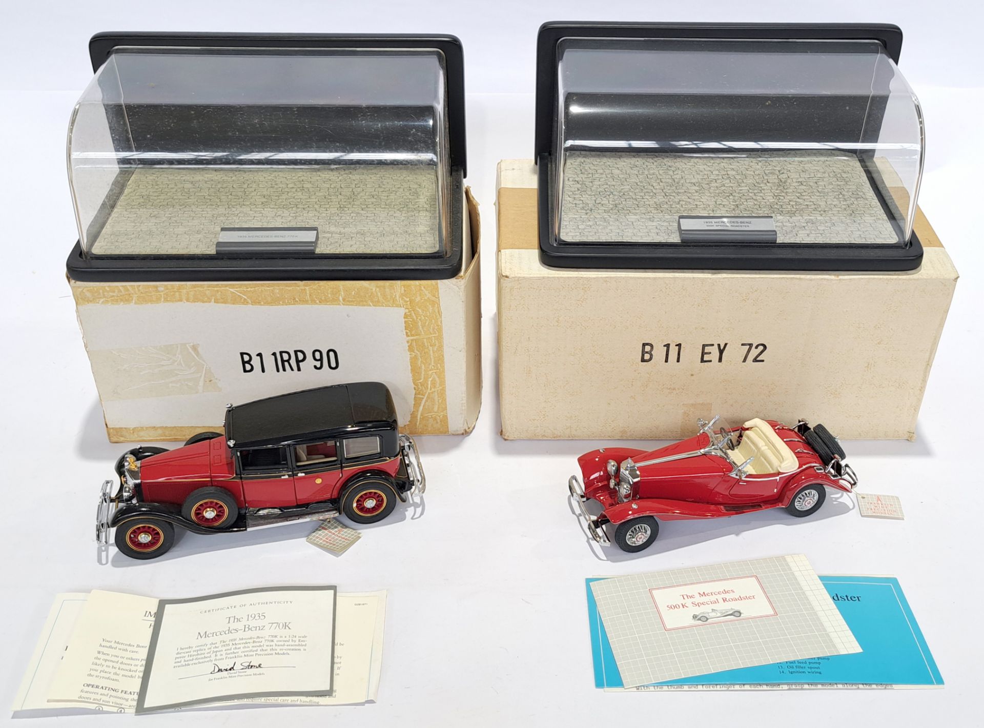 Franklin Mint, a boxed pair with display cases