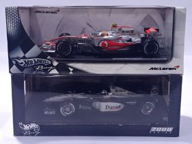 Hot Wheels 1/18th - McLaren MP4-22 "Lewis Hamilton" and Mercedes "David Coulthard". Conditions ge...
