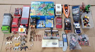 Playmobil, a mostly unboxed group of vehicles, figures and accessories