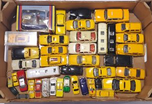 Corgi, ERTL and similar a mixed mainly unboxed Taxi/bus group. Conditions generally appear Good t...