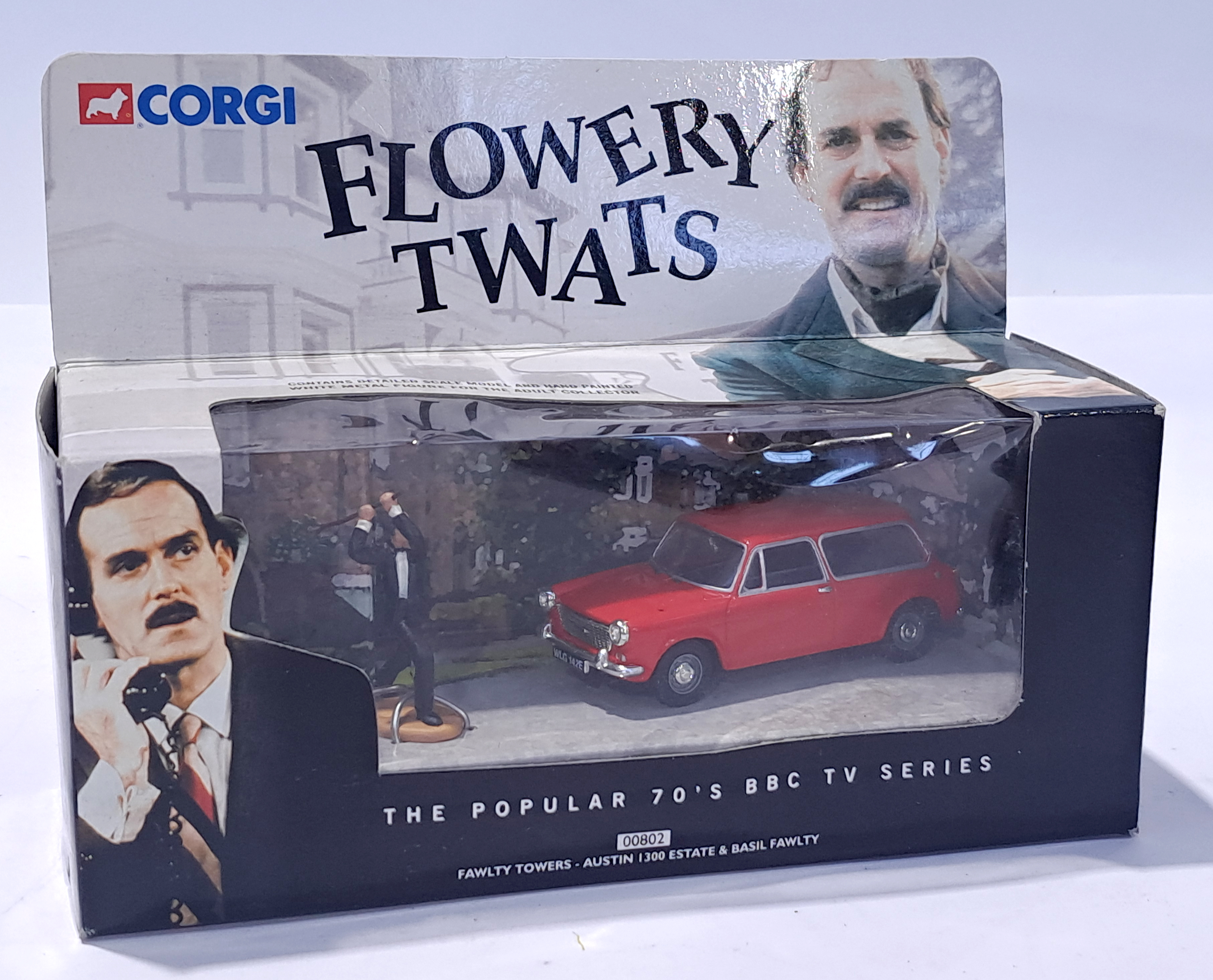 Corgi 00802 "Fawlty Towers" Austin 1300 Estate - red with "Basil Fawlty" figure in rare "Flowery ...