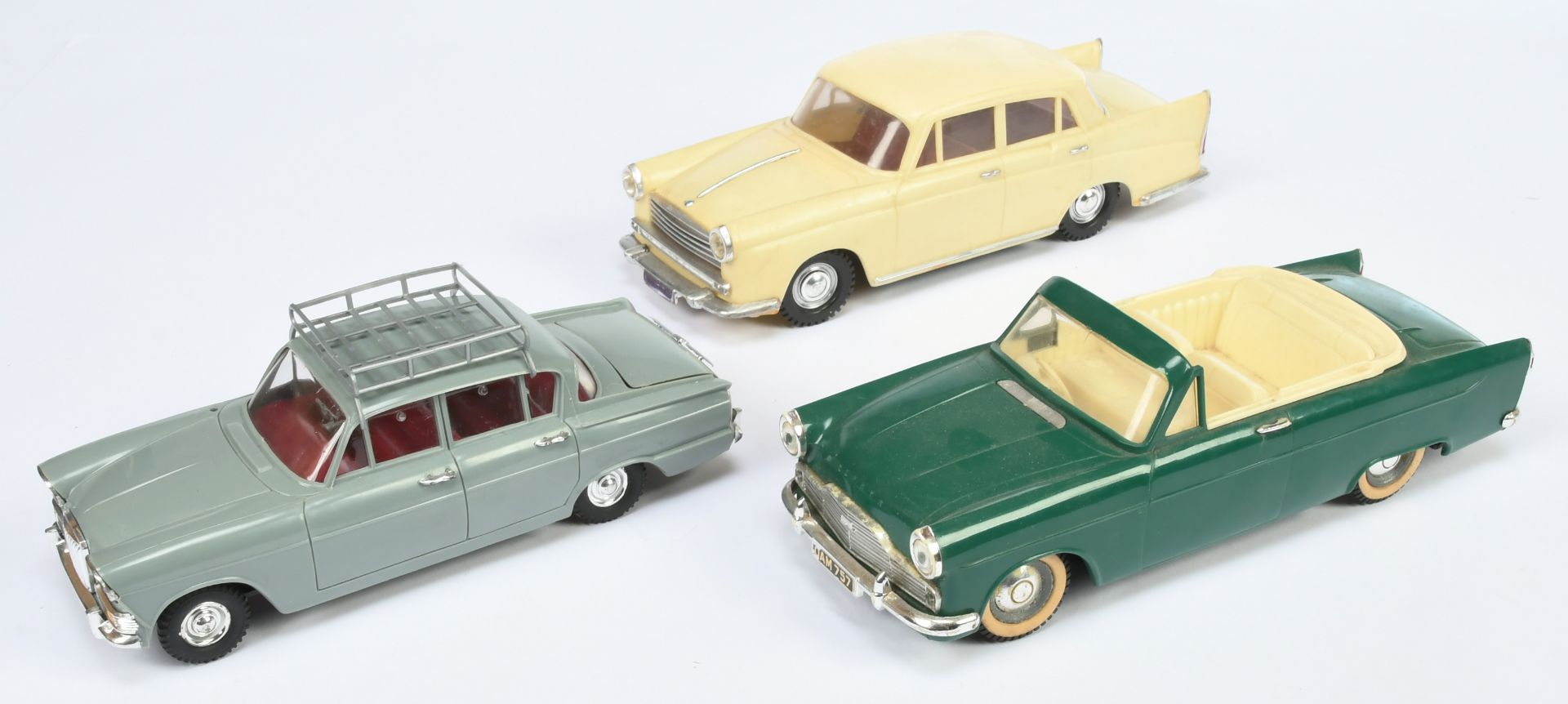 A group of plastic battery operated cars (not tested), Manufactured by Triang, TAT and OK Toys re...