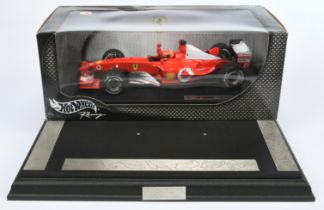 Hot Wheels 1/18th scale 54626 Ferrari M. Schumacher F 2002, also includes F 2002 World Champion M...