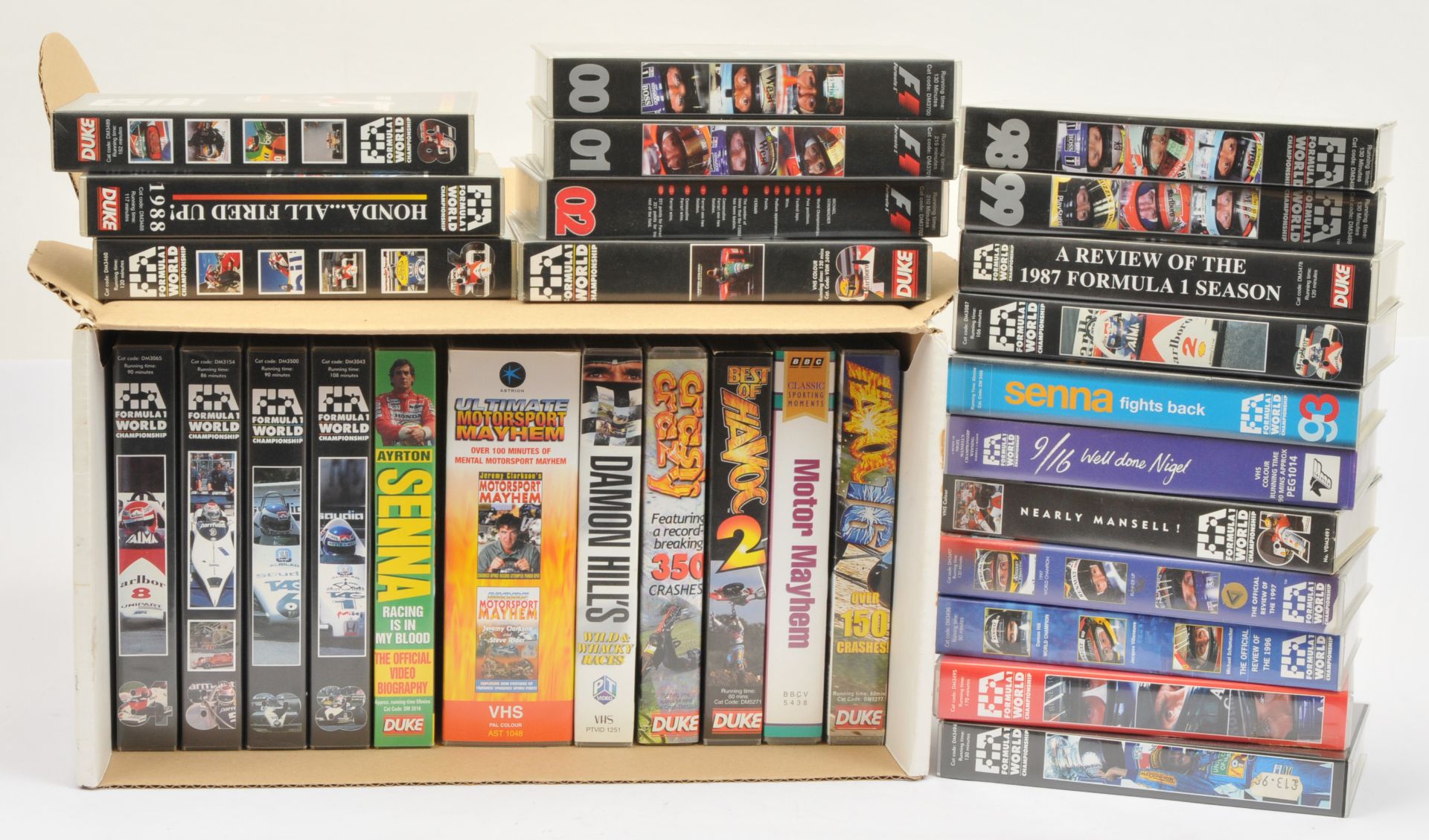 A mixed collection of Motor Racing & related VHS including Formula 1 season reviews 1984 - 2002, ...