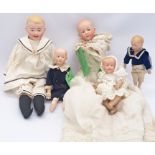 Group of character bisque dolls with intaglio eyes, including Gebruder Heubach 76/02