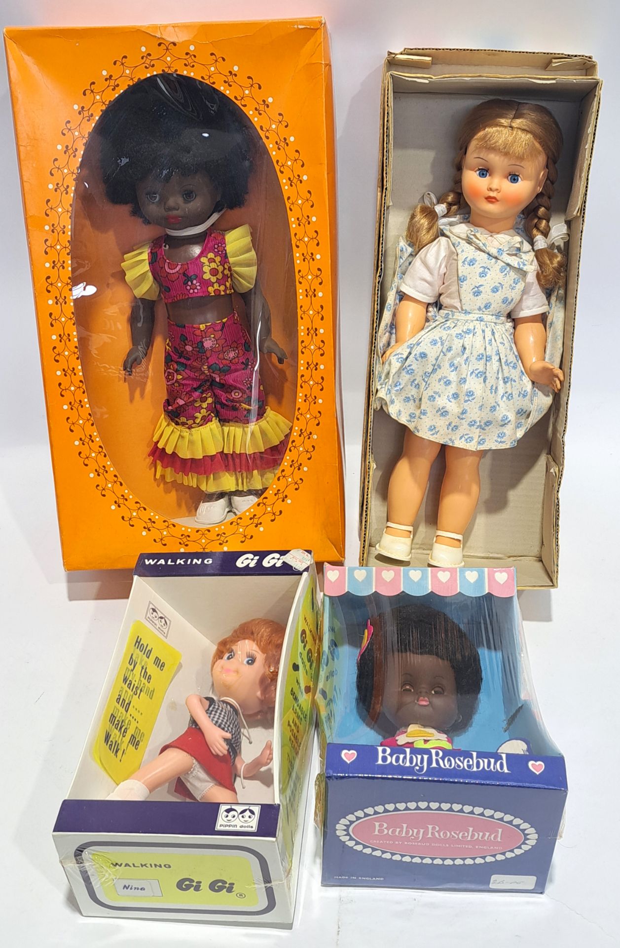 Collection of boxed vintage dolls, including Baby Rosebud and Walking Gi Gi