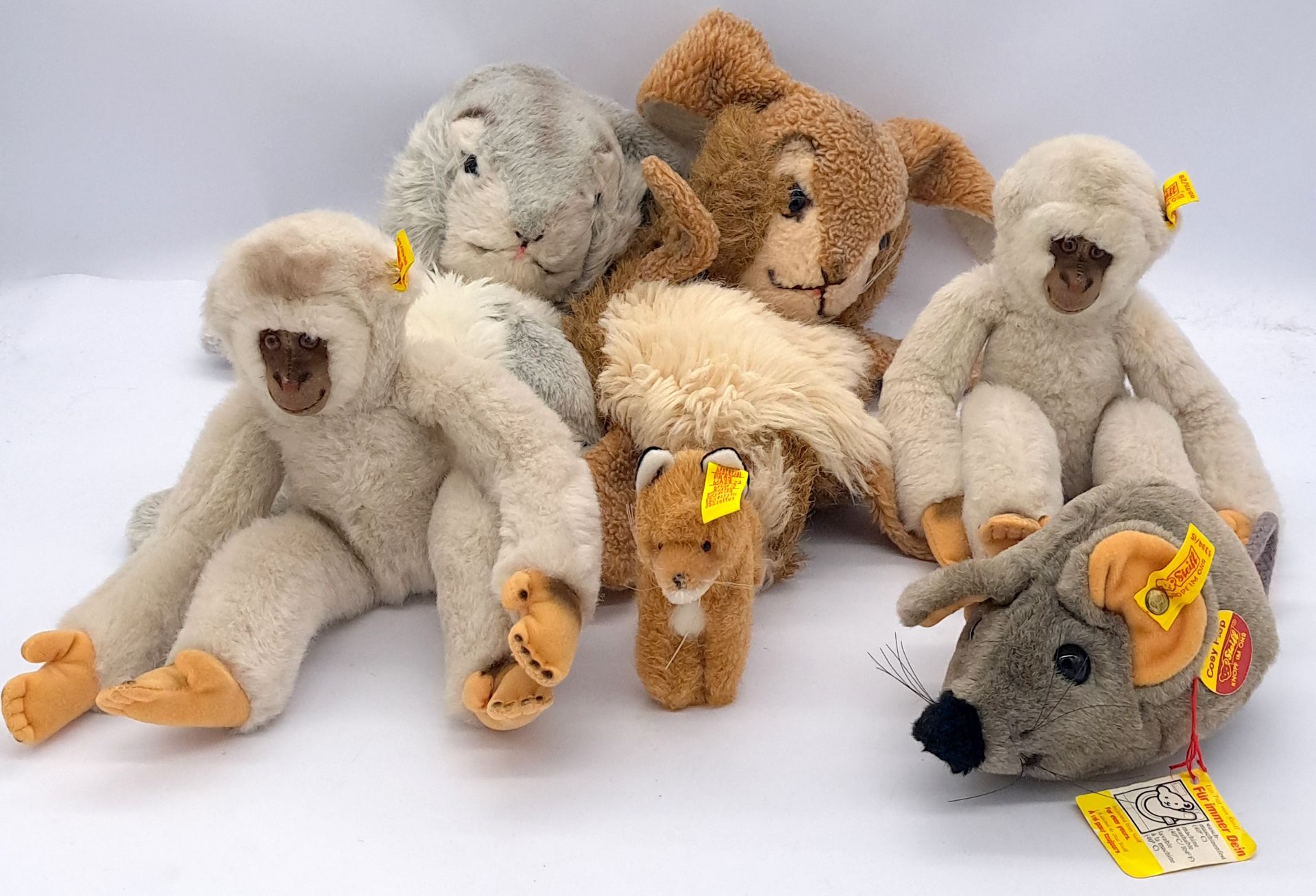 Steiff collection of plush animals, including Jolly Hase hand puppets