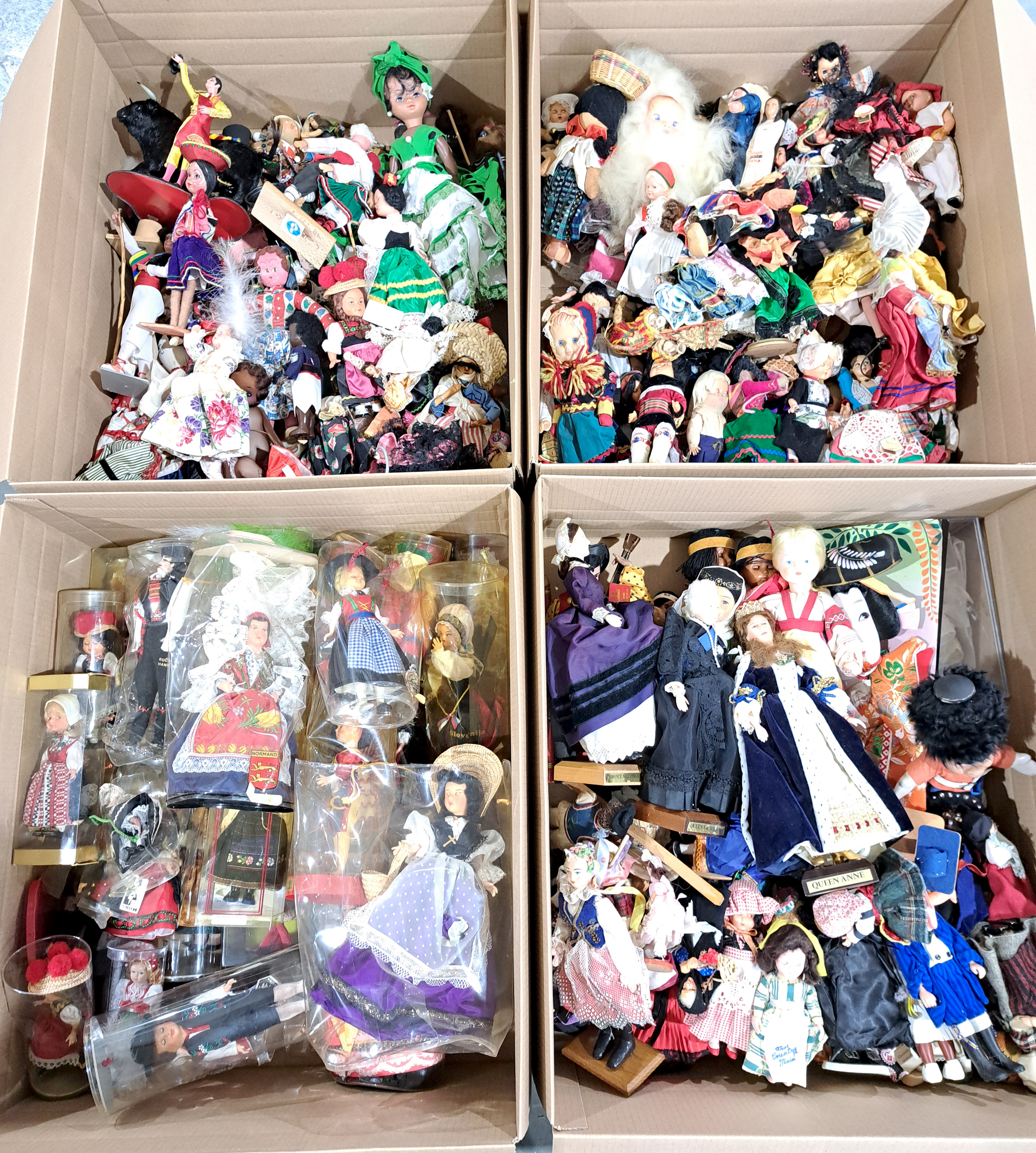 Large quantity of vintage costume dolls