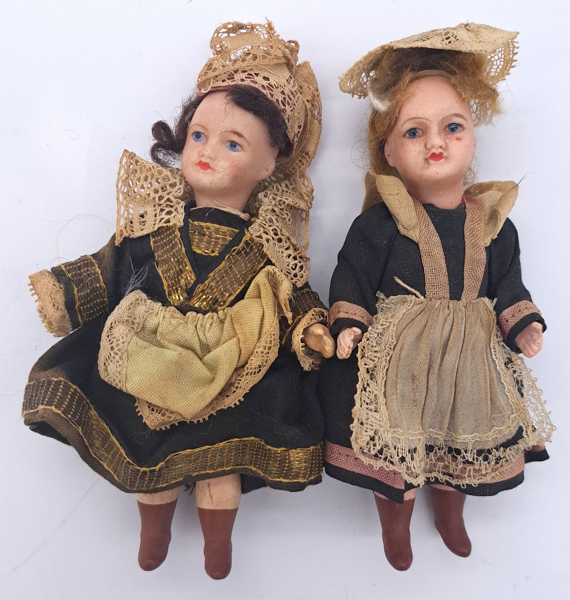 Pair of antique bisque French doll's house dolls