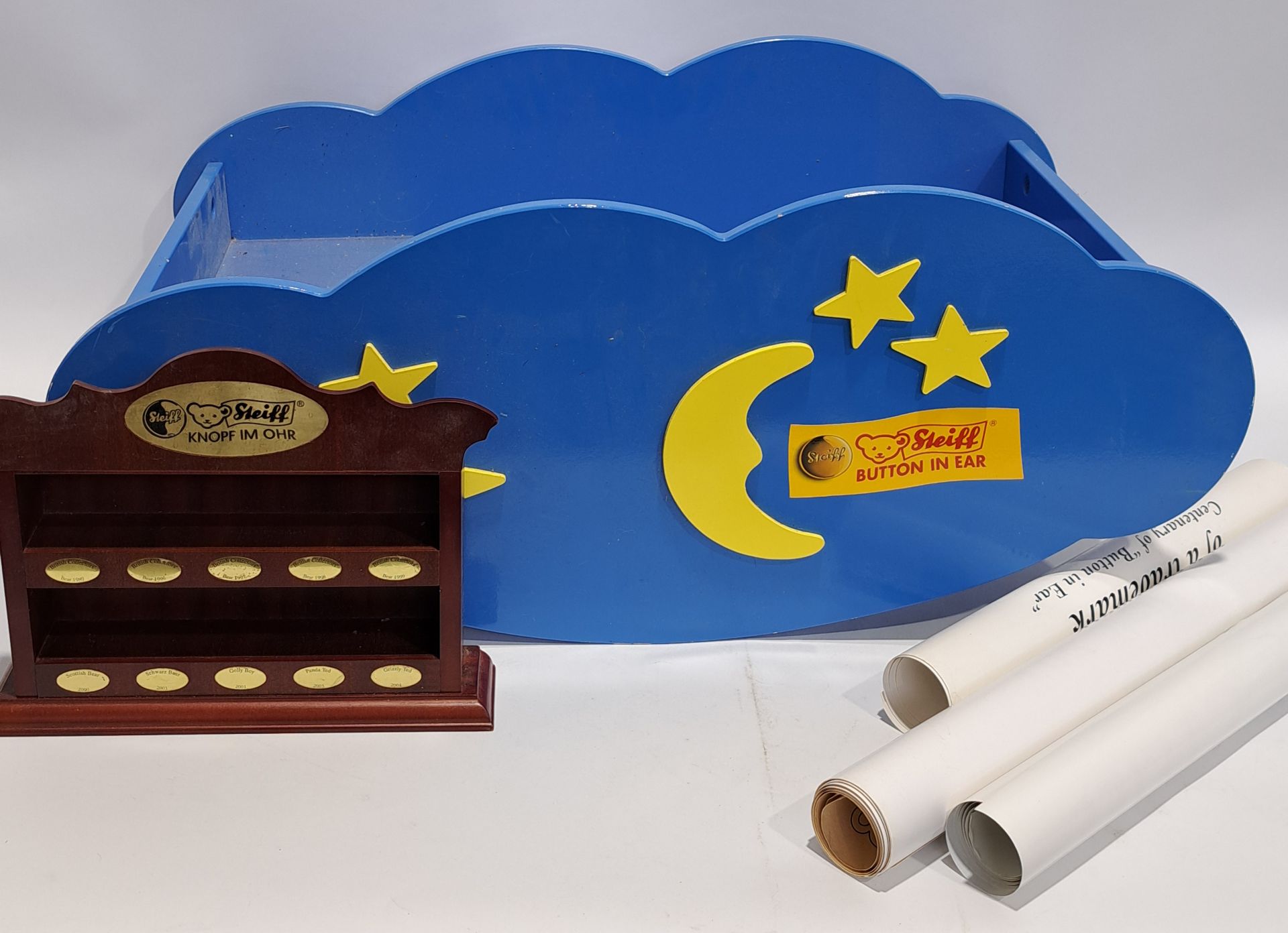 Steiff display cloud rocker, plus wooden display case and Steiff posters