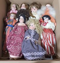 Assortment of vintage bisque dolls, including Armand Marseille