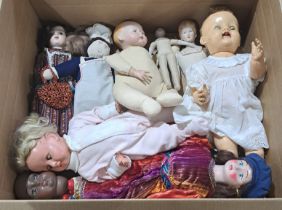 Collection of hard plastic, bisque, composition and cloth dolls