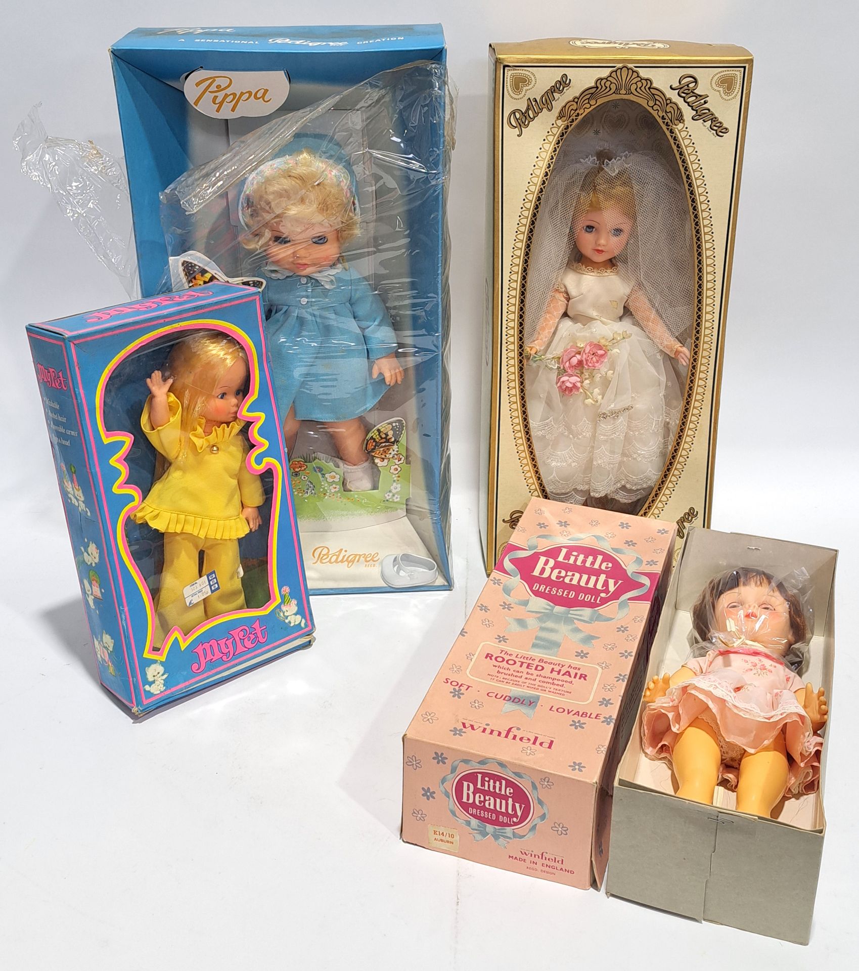 Collection of boxed vintage dolls including Pedigree