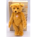 Steiff teddy bear with press-and-listen music-box