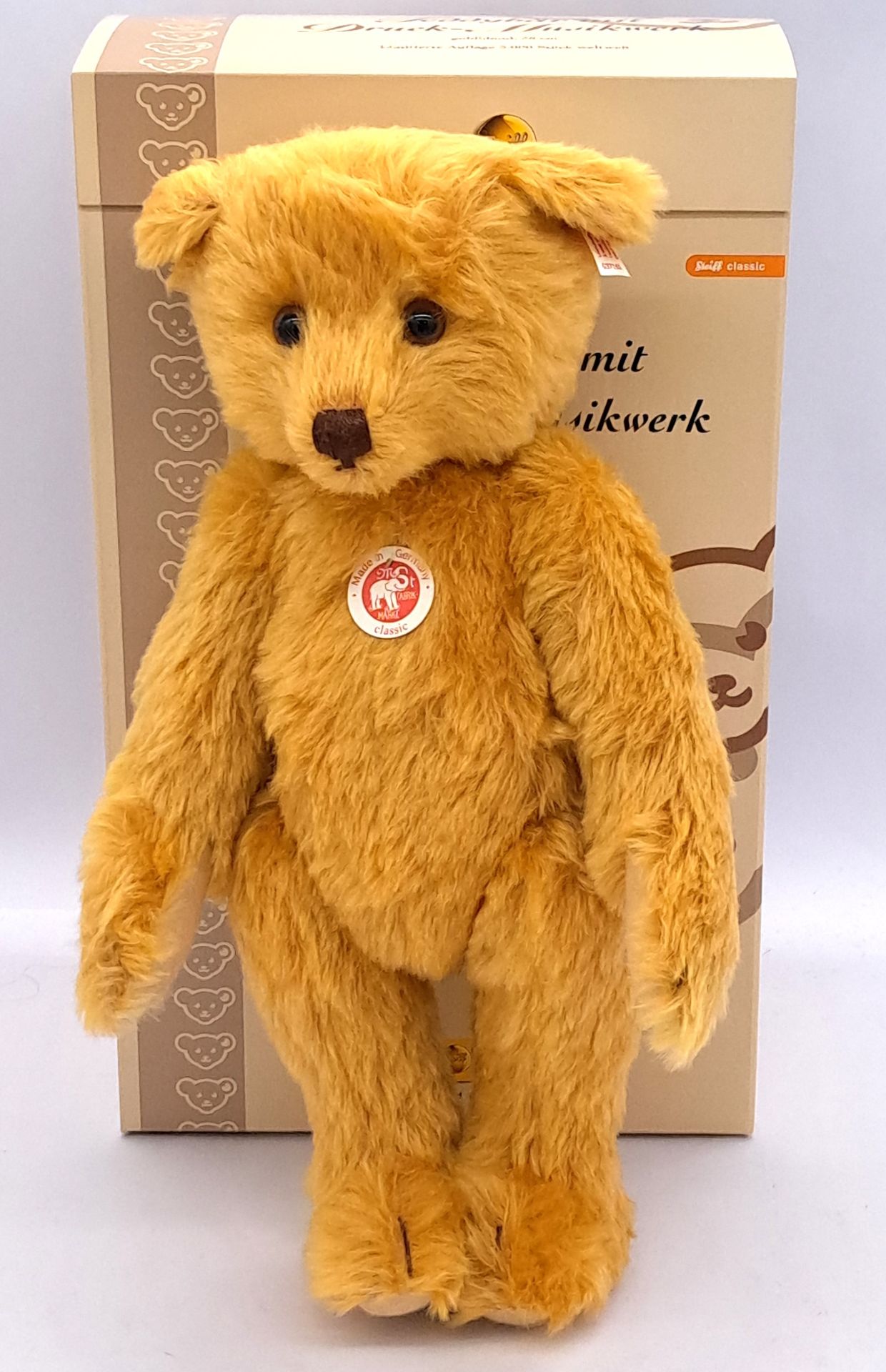 Steiff teddy bear with press-and-listen music-box