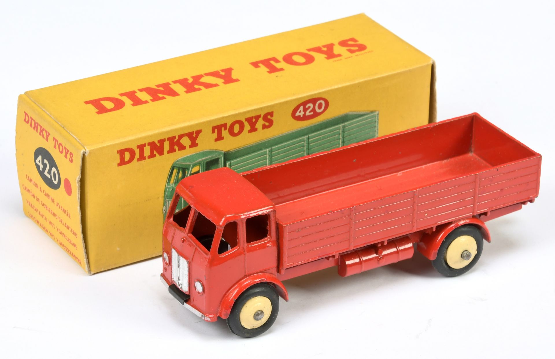 Dinky Toys 420 Forward Control Lorry - Red cab, back and chassis, cream rigid hubs with smooth ty...