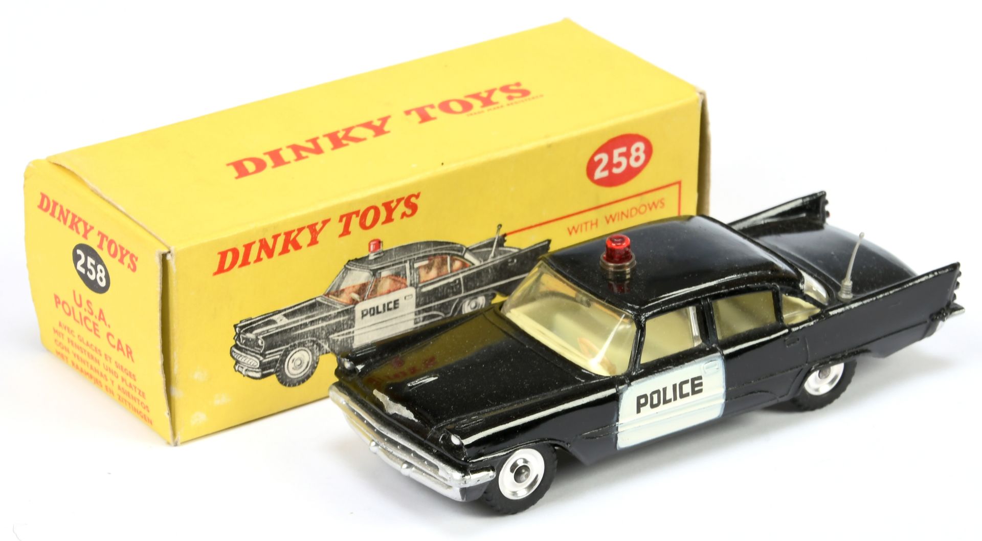 Dinky Toys 258 De Soto Firelite "USA Police" Car - Black body, white door panels, very pale lemon...