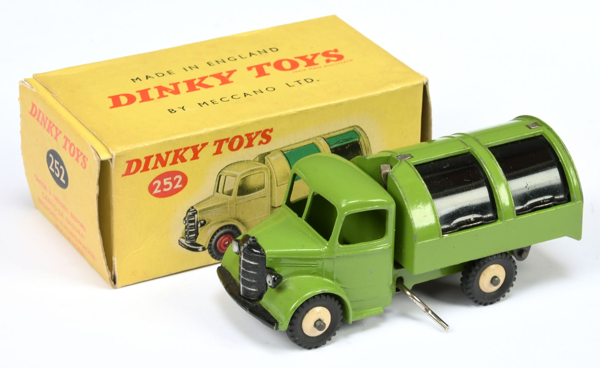 Dinky Toys 252 Bedford Refuse Wagon - Green body, black tinplate opening shutters and rear door, ...