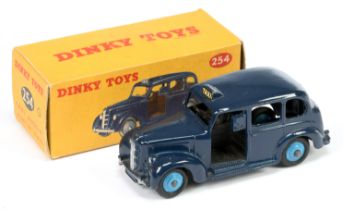 Dinky 254 Austin "Taxi" - Blue body, mid-blue rigid hubs, black base and interior, silver trim 
