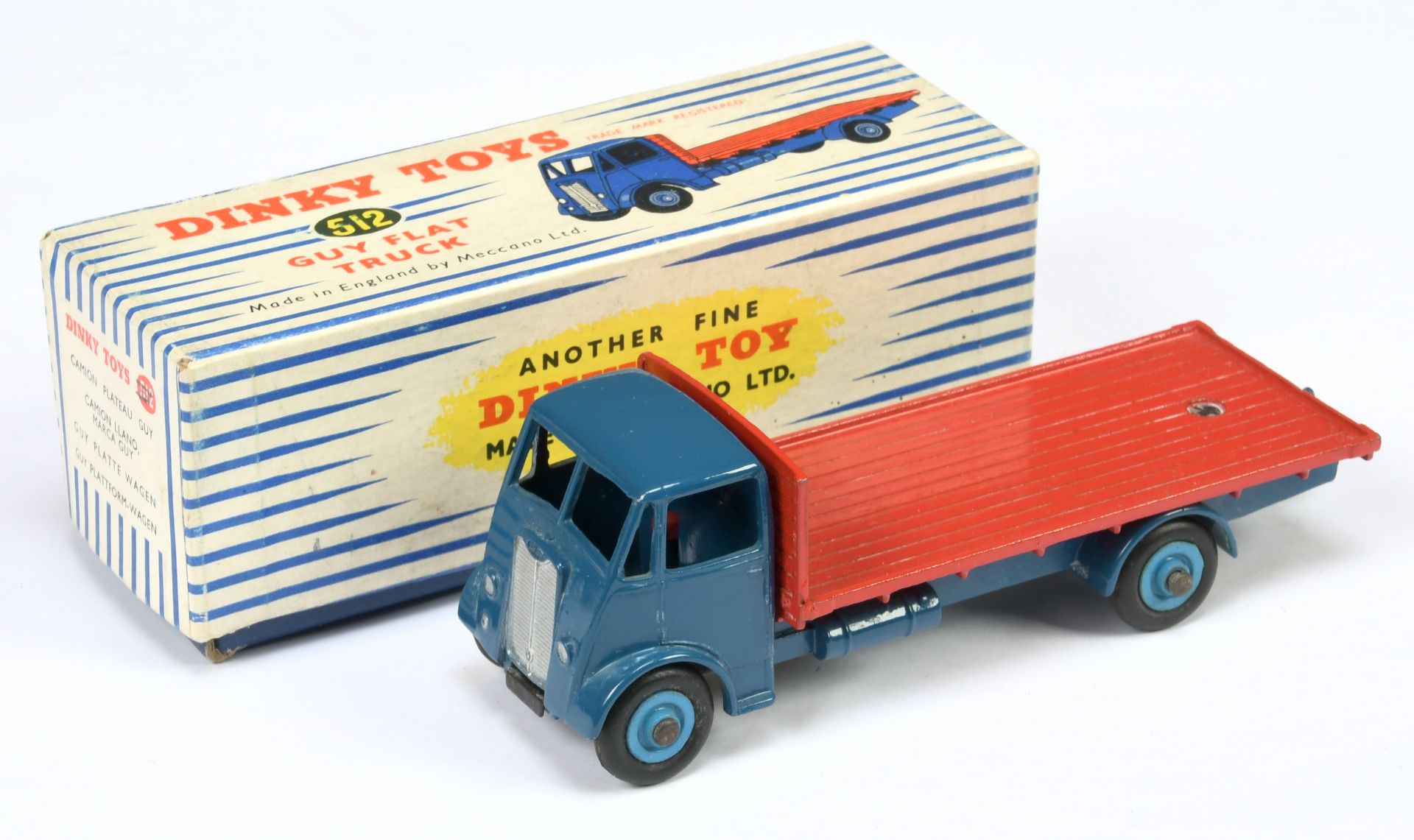 Dinky Toys 512 Guy (type 1) Flat Truck - Blue body, red body, mid-blue supertoy hubs, silver trim...