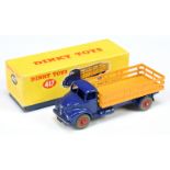 Dinky Toys 417 Leyland Comet Lorry - Violet blue cab and chassis, deep yellow stake back, red sup...