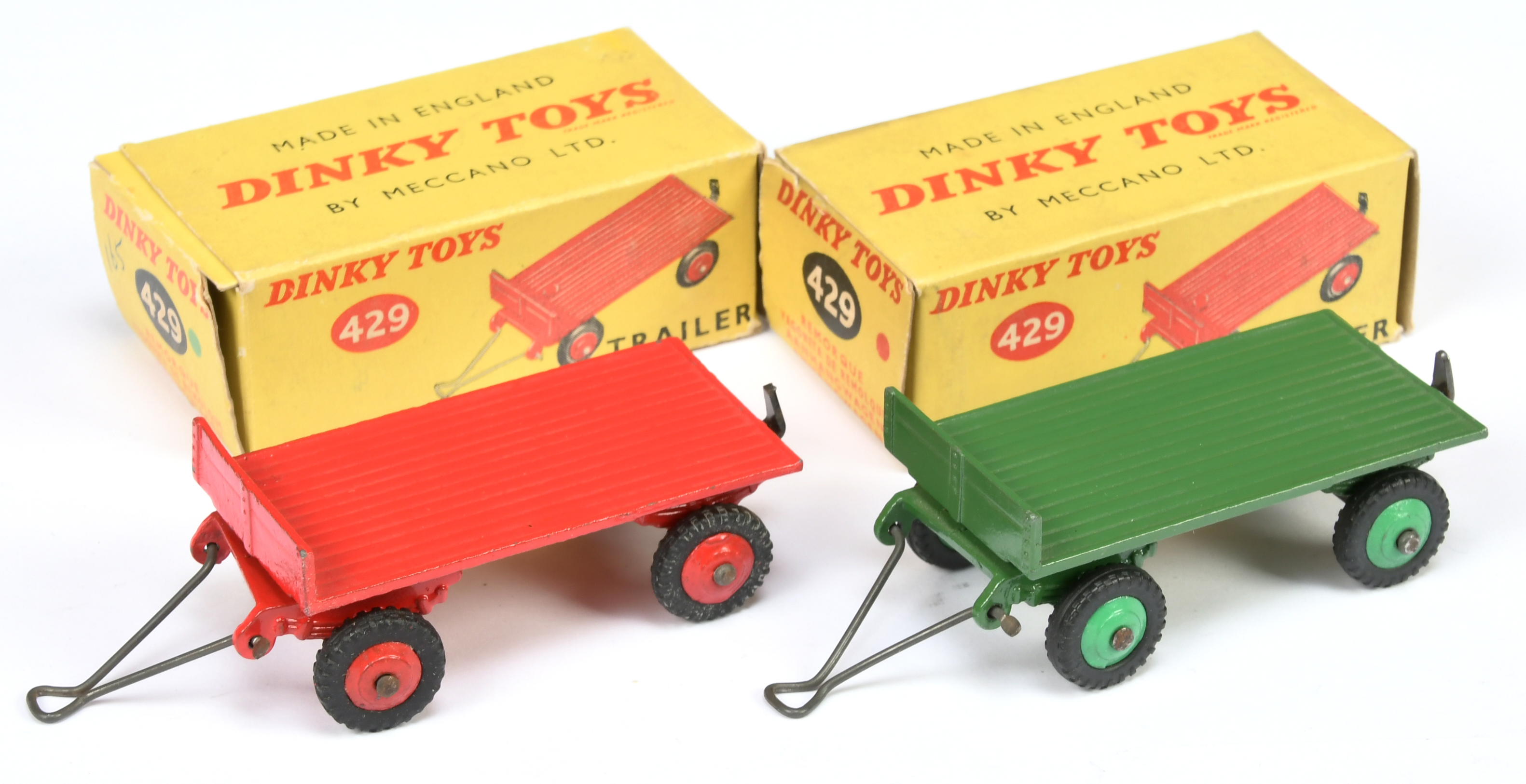 Dinky Toys 429 Trailer A Pair - (1) Green with mid-green rigid hubs, metal tow hook and draw bar ...