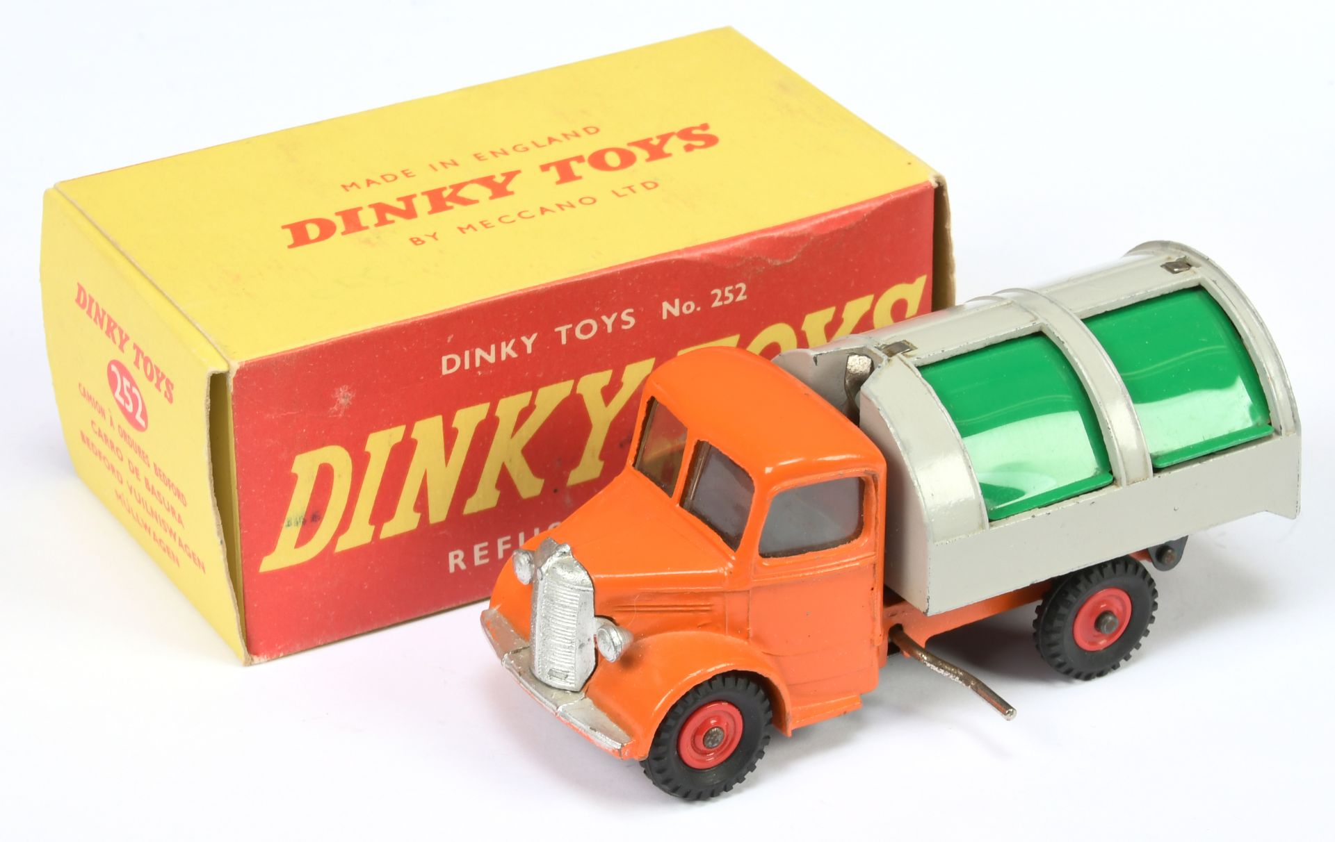 Dinky Toys 252 Bedford Refuse Wagon - Orange body and chassis, green tinplate opening shutters an...