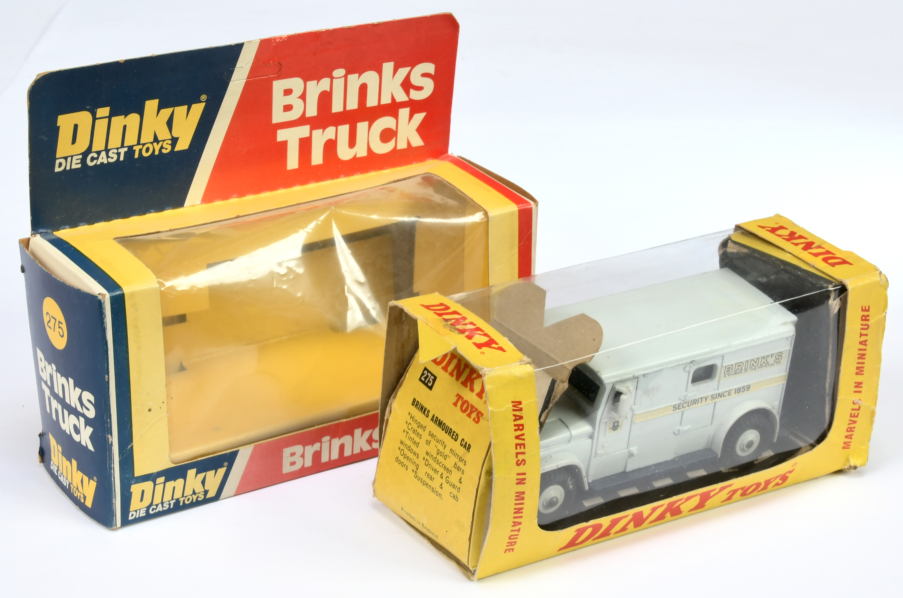 Dinky Toys 275 Brinks Armored Truck - Pale grey including roof,and plastic hubs, blue base