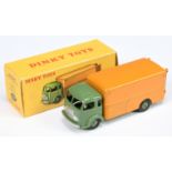 French Dinky Toys 33A Simca Cargo Truck - Drab green cab, chassis and convex hubs, orange back an...