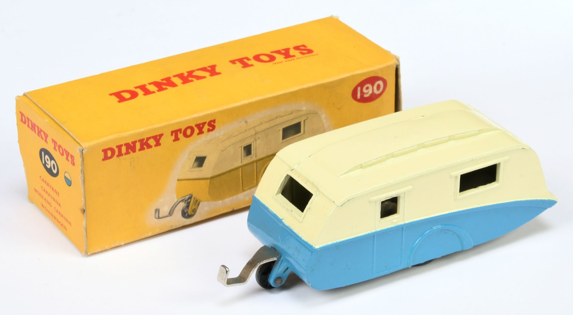 Dinky Toys 190 Caravan - Two-Tone Cream over mid-blue, smooth black metal jockey wheel, chrome dr...