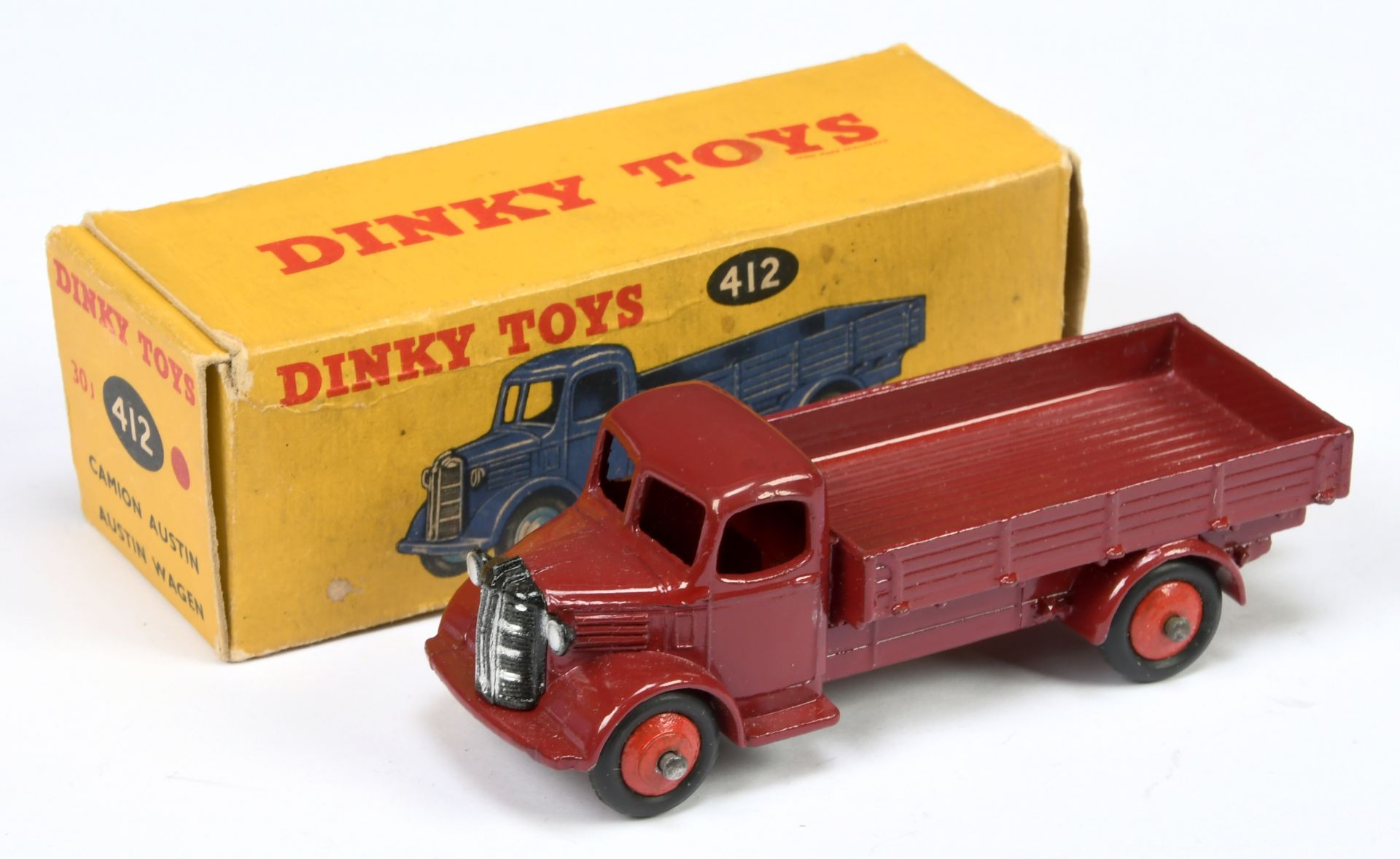 Dinky Toys 412 (30J) Austin Open back Wagon - Maroon body, chassis and back, red rigid hubs with ...