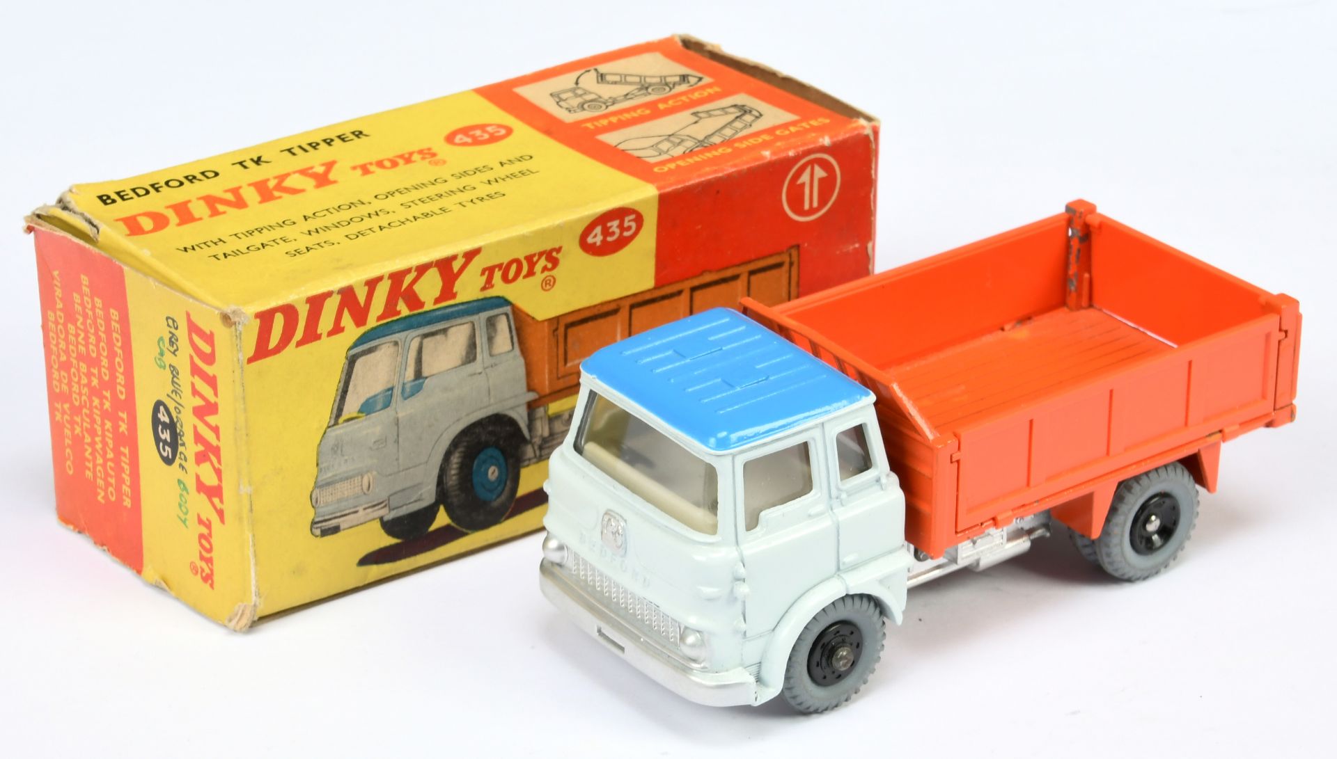 Dinky Toys 435 Bedford TK Tipper - Pale grey mid-blue roof, orange back and side panels, silver t...